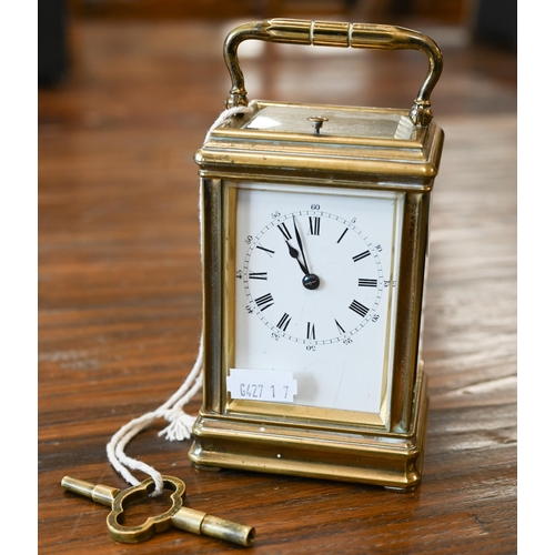 512 - A carriage clock repeat striking on a coiled gong, 15 cm overall