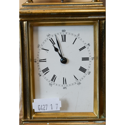 512 - A carriage clock repeat striking on a coiled gong, 15 cm overall