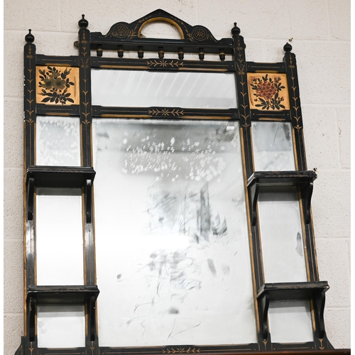 517 - A Victorian Aesthetic Movement parcel gilt and ebonised over-mantel mirror with an arrangement of di... 