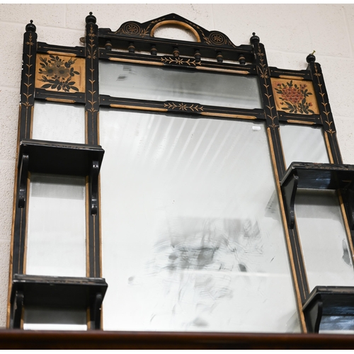 517 - A Victorian Aesthetic Movement parcel gilt and ebonised over-mantel mirror with an arrangement of di... 