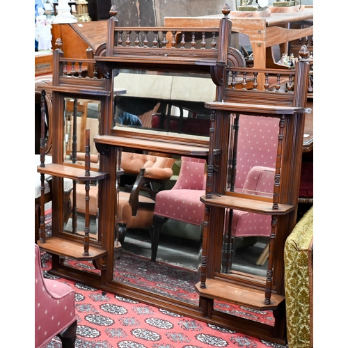 518 - A late 19th century walnut framed over mantel with an arrangement of mirrors and display shelves, 12... 