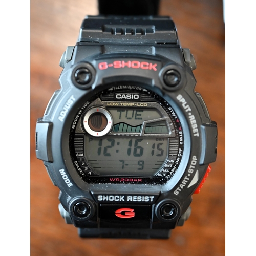 59 - A Casio G-shock wristwatch, in fitted tin, boxed with booklet and card - unused, running at time of ... 