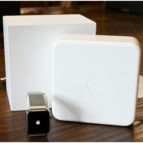 An Apple Series 3 wristwatch, magnetic stainless band, boxed with charge cable, usb plug and booklet - as found no warranty