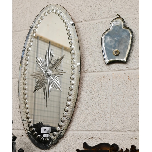 64 - A sorcerer's mirror 61 cm x 30 cm to/w a small mirror back sconce (no sconce arm) 18 cm x 13 cm, bot... 