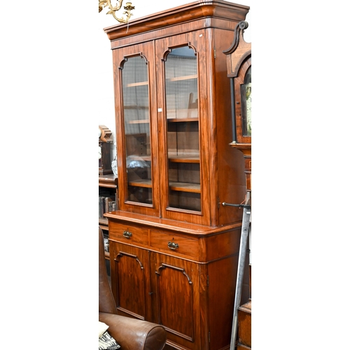 66 - A Victorian mahogany chiffonier bookcase with glazed doors over drawers and panelled cupboards, 110 ... 