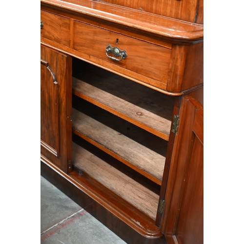 66 - A Victorian mahogany chiffonier bookcase with glazed doors over drawers and panelled cupboards, 110 ... 