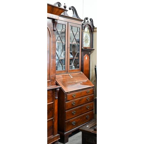 69 - A 19th century mahogany inlaid bureau bookcase with astragal glazed doors over fall-front panel with... 