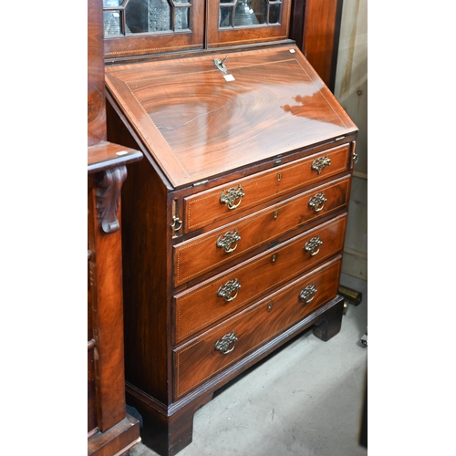 69 - A 19th century mahogany inlaid bureau bookcase with astragal glazed doors over fall-front panel with... 