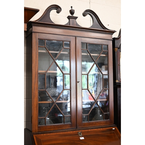 69 - A 19th century mahogany inlaid bureau bookcase with astragal glazed doors over fall-front panel with... 