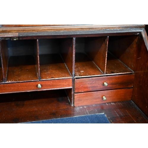 69 - A 19th century mahogany inlaid bureau bookcase with astragal glazed doors over fall-front panel with... 