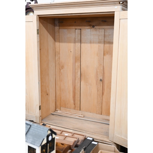 72 - A pine wardrobe with arch panelled doors and single drawer to base a/f, 120 x 56 x 204 cm high