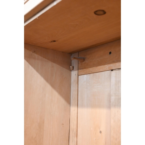 72 - A pine wardrobe with arch panelled doors and single drawer to base a/f, 120 x 56 x 204 cm high