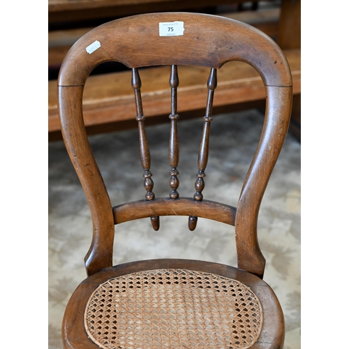 75 - A Victorian spindle back correction chair with caned seat