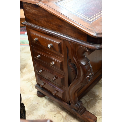 76 - A walnut Davenport with gilt tooled leather top and four drawers to each side, 56 x 54 x 85 cm high