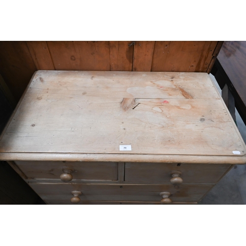 79 - A small pine chest of two short over two long drawers raised on turned supports, 86 x 48 x 84 cm hig... 