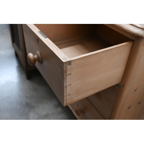 79 - A small pine chest of two short over two long drawers raised on turned supports, 86 x 48 x 84 cm hig... 