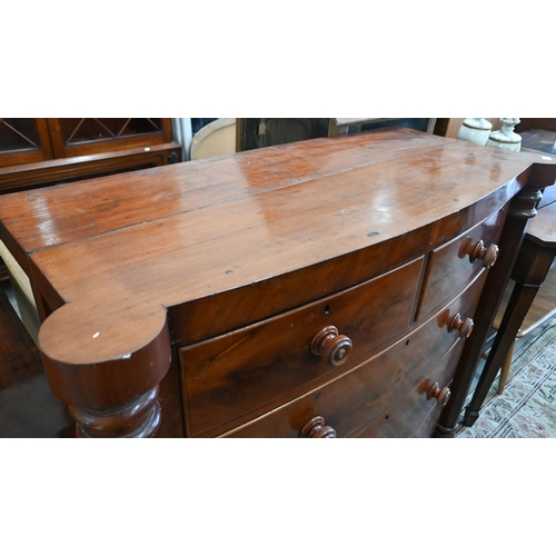 87 - A 19th century mahogany bowfront chest of two short over three long drawers between octagonal pillar... 