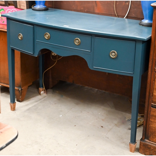 92 - A blue painted three drawer sideboard with brass handles and tapering square supports, 122 x 54 x 84... 