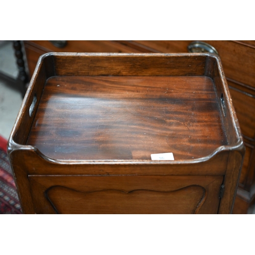 96 - A Georgian style mahogany bedside cabinet with panelled door, 40 x 32 x 74 cm high