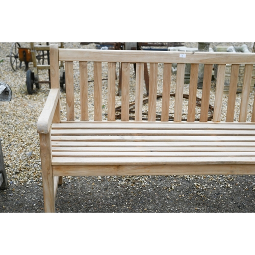 12 - A contemporary teak 'Surrey' design slatted garden bench, 150 cm long