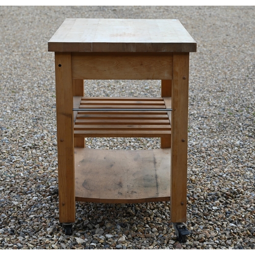 347 - A traditional beech kitchen island trolley unit, with two frieze drawers over two wicker baskets and... 