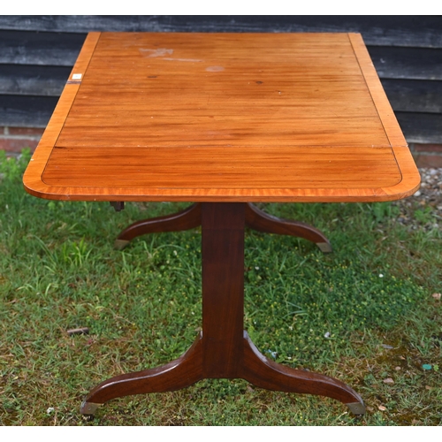 348 - A Victorian mahogany drop end sofa table, with two frieze drawers and raised on trestle ends united ... 