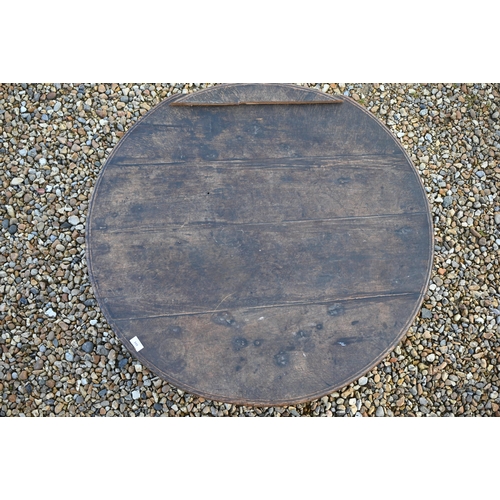 349 - An antique low circular hardwood coffee table, on four square legs, 102 cm dia. x 32 cm h, top part ... 