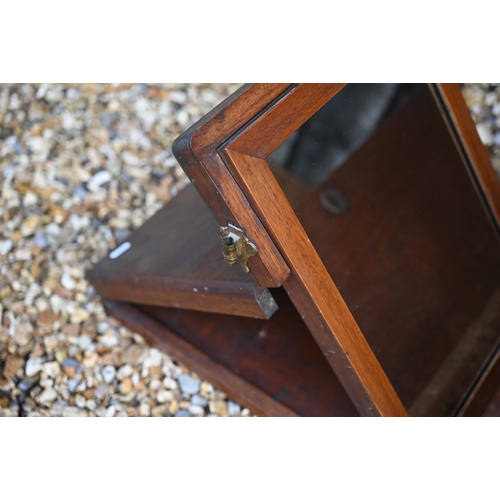 354 - A small antique teak campaign trunk with brass carrying handles, 57 cm x 35 cm x 39 cm h to/with a m... 