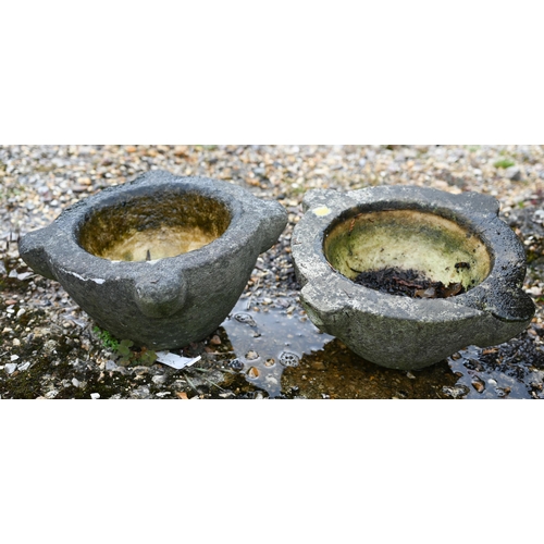 4 - Two weathered four lobe marble mortars, 32 cm and 34 cm dia. (2)