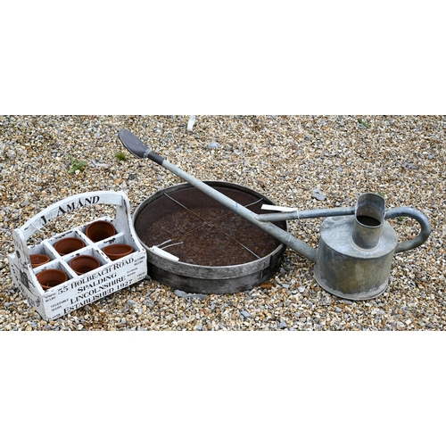 40 - Six small terracotta pots in branded wooden carrying box to/with a galvanised watering can and a gar... 