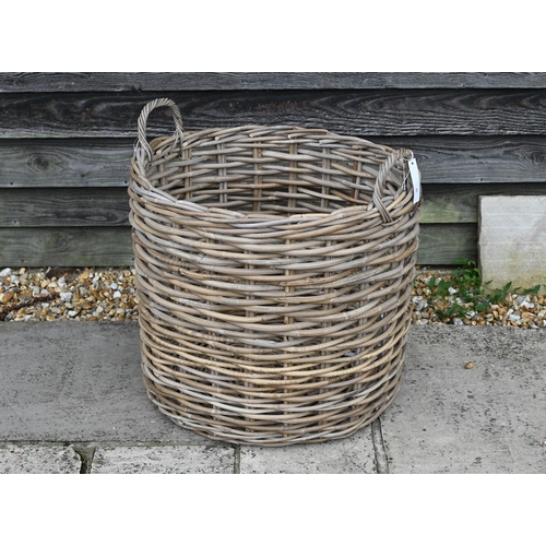 45 - A 'giant' wicker log basket with twin loop handles, 63 cm dia. x 51 cm h, new old-stock