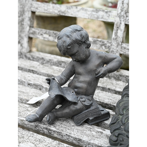 50 - A classic lead seated putti with scroll to/w a bronzed lion wall mask with hinged mouth, both a/f (2... 