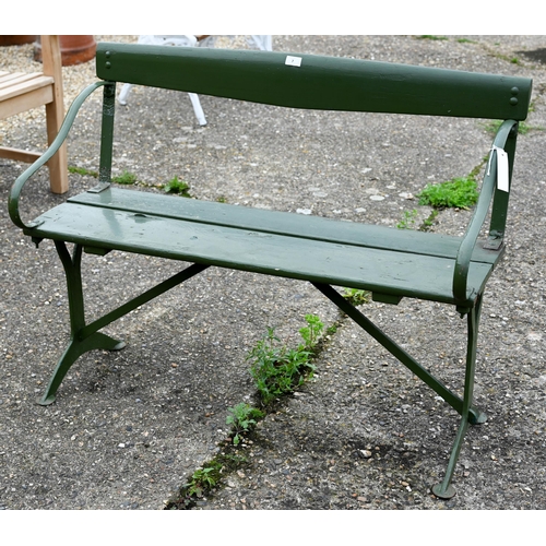 7 - A vintage green painted wood plank iron framed bench, 107 cm long