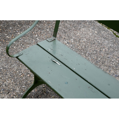 7 - A vintage green painted wood plank iron framed bench, 107 cm long