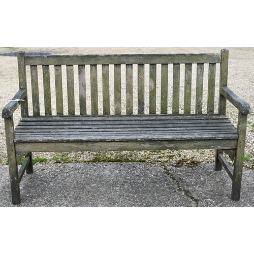 8 - A weathered teak slatted garden bench, 150 cm long