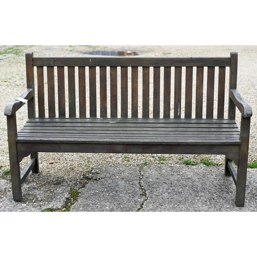 9 - A weathered teak garden bench, 150 cm long