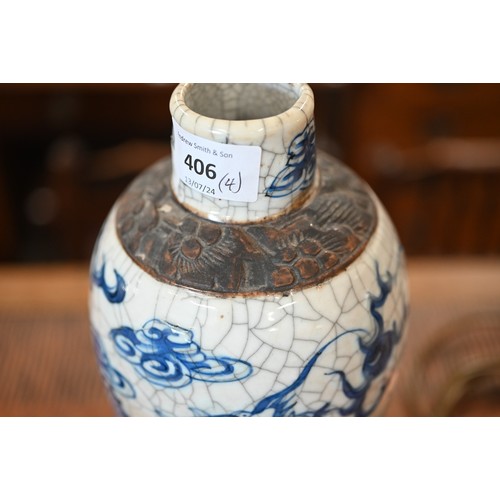 406 - A Chinese blue and white vase painted with dragons on a crackle glaze with incised biscuit bands,27 ... 