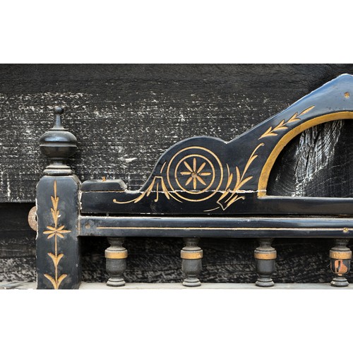 517 - A Victorian Aesthetic Movement parcel gilt and ebonised over-mantel mirror with an arrangement of di... 