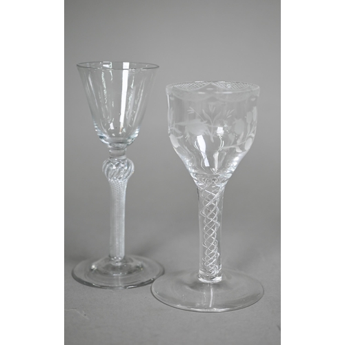 12 - A cordial glass with round funnel bowl on air twist baluster stem and conical foot, 16 cm, to/w a wi... 