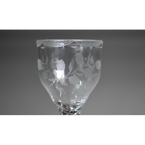 12 - A cordial glass with round funnel bowl on air twist baluster stem and conical foot, 16 cm, to/w a wi... 