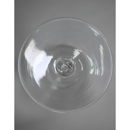 12 - A cordial glass with round funnel bowl on air twist baluster stem and conical foot, 16 cm, to/w a wi... 