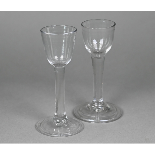 13 - An 18th Century cordial glass with ogee bowl on plain stem and folded foot, 14cm, to/w a somewhat si... 