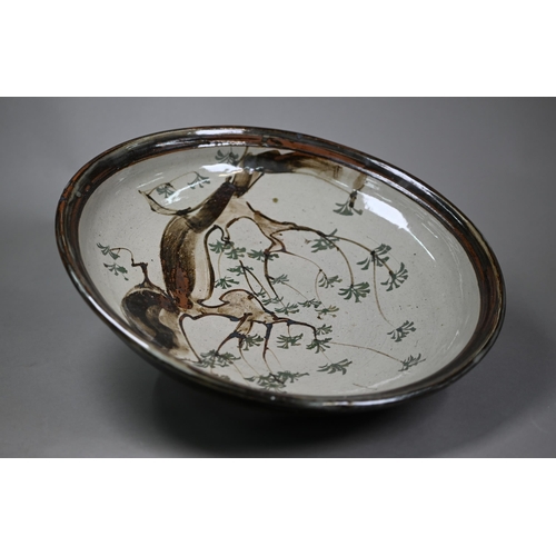 28 - John Bedding (St. Ives): a brown-glazed large bowl, painted with trees in his typical Japanese manne... 