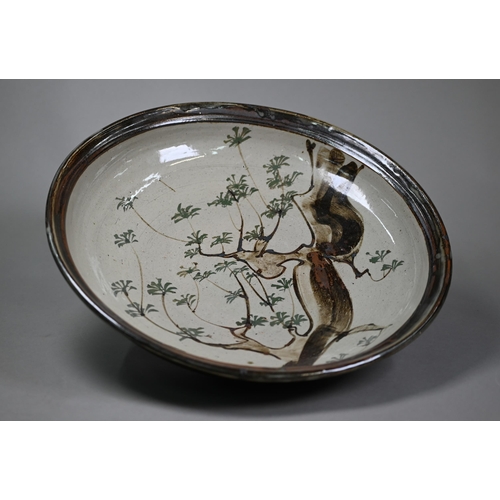 28 - John Bedding (St. Ives): a brown-glazed large bowl, painted with trees in his typical Japanese manne... 