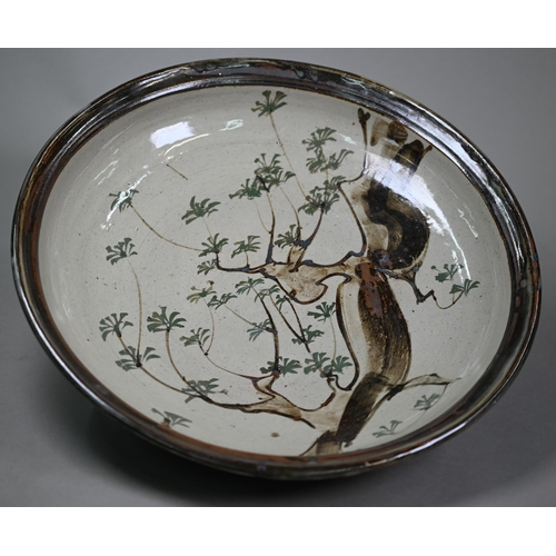 28 - John Bedding (St. Ives): a brown-glazed large bowl, painted with trees in his typical Japanese manne... 