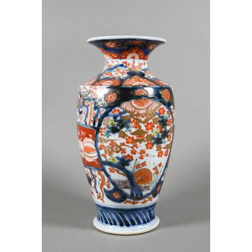 63 - A pair of 19th century Japanese Imari vases, Meiji period (1868-1912) painted with phoenix, landscap... 