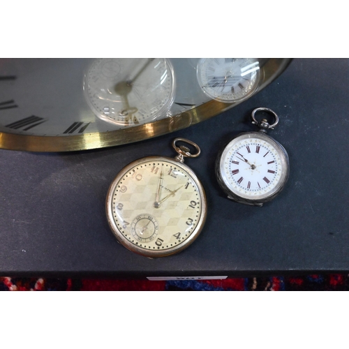 108 - A 19th century French brass drum timepiece with enamelled dial, 13 cm diameter, to/w a Swiss .935 st... 