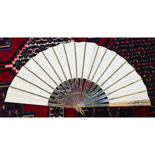 115 - An antique fan, the paper leaf painted in watercolour with Muses, on painted tortoiseshell (probably... 