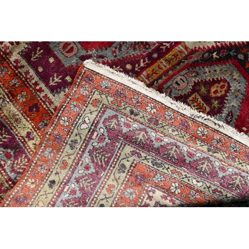 239 - An old Caucasian Shirvan rug, the diamond lozenge pole design on red-brown ground, 200 cm x 130 cm20... 