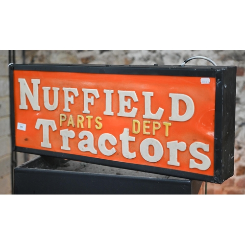 An illuminated trade sign - 'Nuffield Tractors Parts Dept', 73 x 29 cm